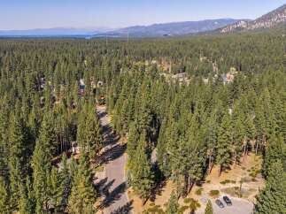 Discover this stunning property nestled amidst a dense forest of mature pine trees, offering unparalleled privacy and natural beauty.