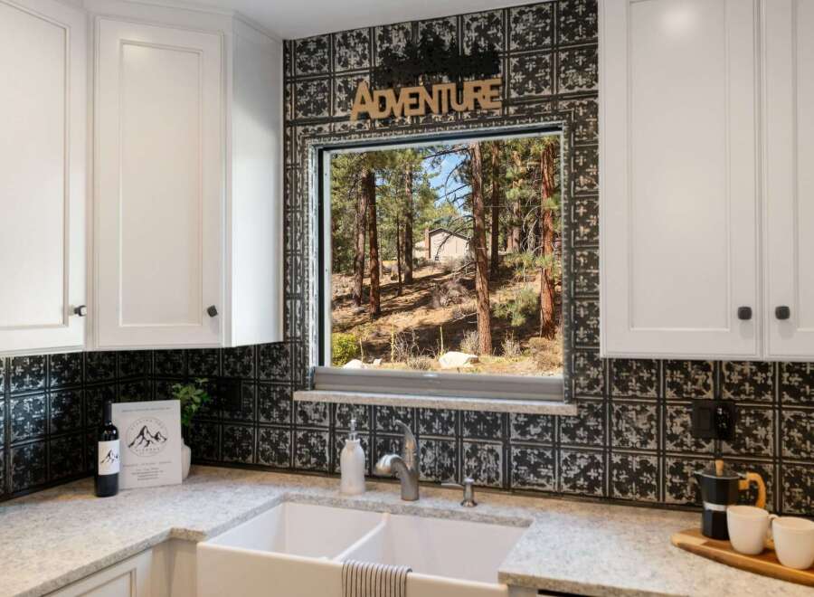 Experience the perfect blend of rustic charm and modern convenience in this beautifully appointed kitchen.