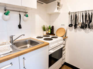 This compact kitchen boasts a functional layout perfect for any home.