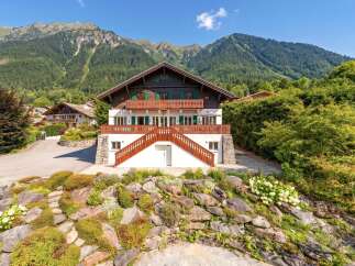 Nestled amidst the majestic Alps, this stunning chalet offers an idyllic retreat with breathtaking mountain views.
