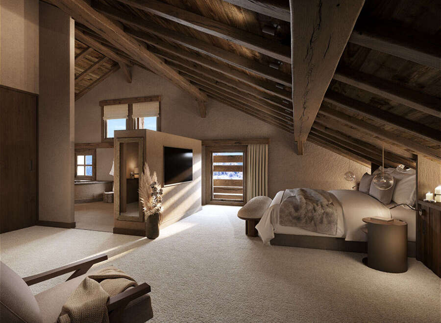 Experience luxurious mountain living in this stunning attic bedroom, featuring exposed wooden beams and a cozy, plush carpet.