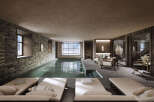 Experience ultimate relaxation in this luxurious indoor spa featuring a serene swimming pool with stunning mountain views through a large window.