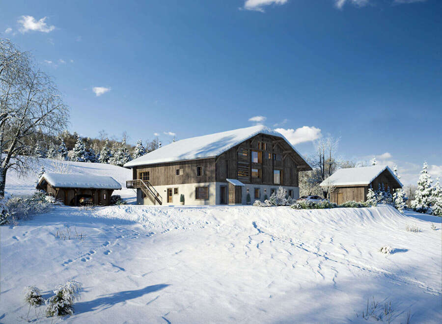 Experience the charm of a winter wonderland with this stunning property nestled in a snowy landscape.