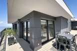 Enjoy breathtaking sea views from this modern balcony, perfect for al fresco dining or simply relaxing in the sun.