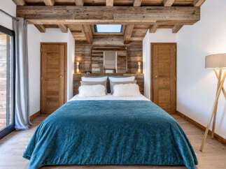 Experience rustic charm and modern comfort in this beautifully appointed bedroom.