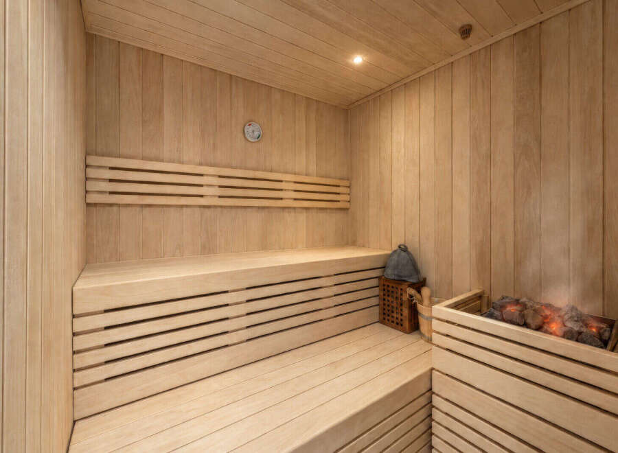 Experience ultimate relaxation in this beautifully crafted wooden sauna.