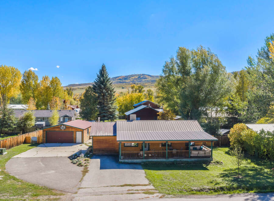 Experience mountain living in this charming log home, perfect for year-round enjoyment.