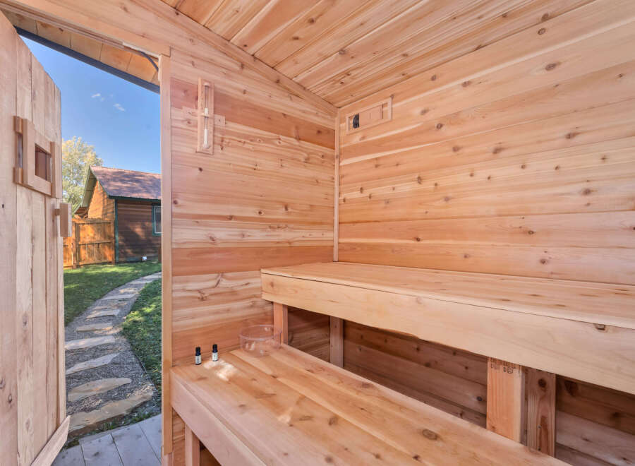 Experience ultimate relaxation in this beautifully crafted wooden sauna.