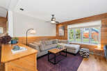 Step into this inviting living room, featuring a spacious sectional sofa perfect for relaxation and entertainment.
