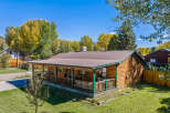 Experience rustic charm in this beautiful log cabin, perfect for a mountain getaway.