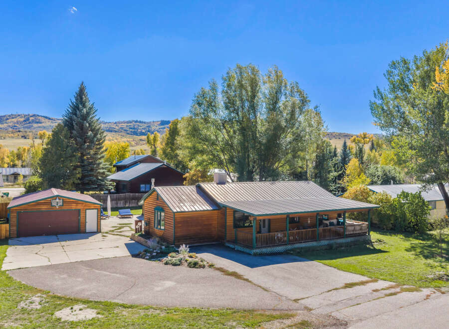 Experience rustic charm in this beautiful log cabin home, perfect for embracing nature and tranquility.