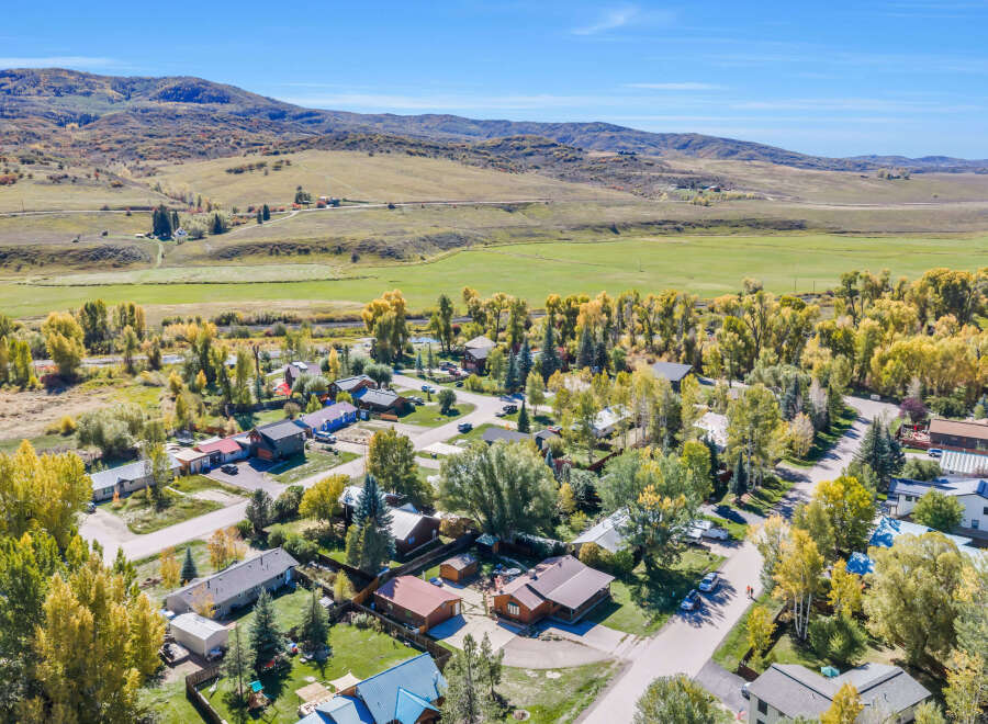 Discover this charming mountain community nestled amidst rolling hills and vibrant autumn foliage.