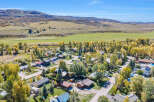 Discover this charming mountain community nestled amidst rolling hills and vibrant autumn foliage.