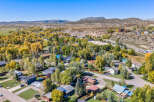 Discover this charming neighborhood nestled amidst vibrant autumn foliage and rolling hills.
