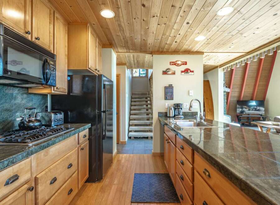 Experience the perfect blend of rustic charm and modern convenience in this beautifully appointed kitchen.
