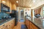 Experience the perfect blend of rustic charm and modern convenience in this beautifully appointed kitchen.