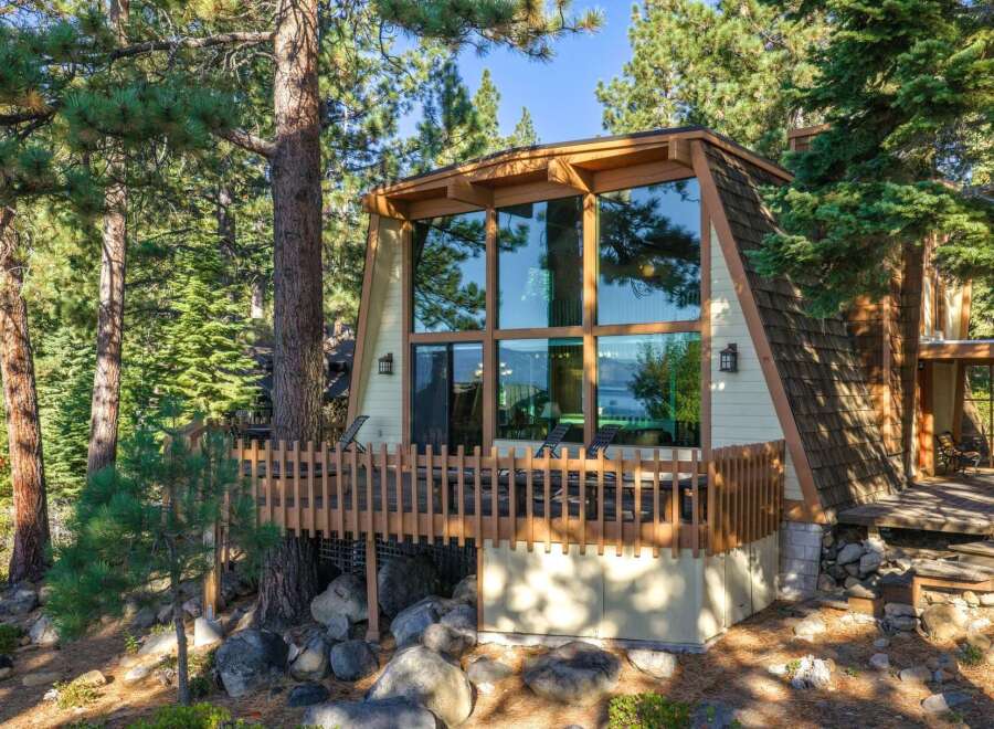 Experience the ultimate mountain retreat in this stunning A-frame cabin nestled amongst towering pine trees.
