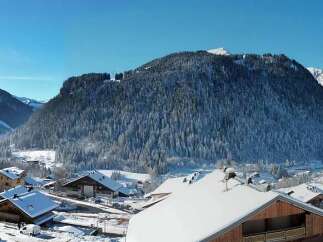 Experience the charm of a winter wonderland with this stunning property nestled in a picturesque mountain village.