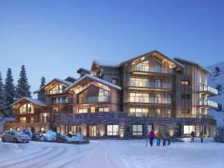 Experience luxury mountain living in this stunning alpine resort, featuring a modern wooden exterior and stone accents.