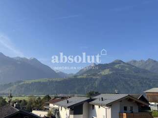 Experience breathtaking mountain views from this stunning property, nestled in a serene alpine setting.