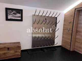 This property features a practical ski boot drying rack, perfect for mountain getaways.