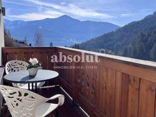 Enjoy breathtaking mountain views from this charming balcony, perfect for your morning coffee or evening relaxation.