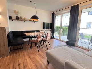 Modern 1-bedroom apartment with a small garden in the center of Kaprun