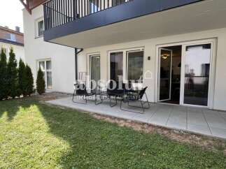 Enjoy outdoor living with this charming patio area, perfect for al fresco dining or relaxing with a morning coffee.