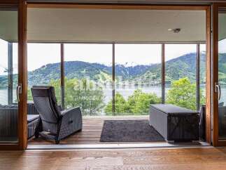 Experience breathtaking lake and mountain views from this stunning balcony, perfect for enjoying your morning coffee or evening relaxation.