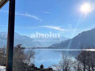 Experience breathtaking mountain and lake views from this stunning property.