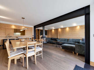 Experience luxurious mountain living in this stunning open-concept living and dining area.