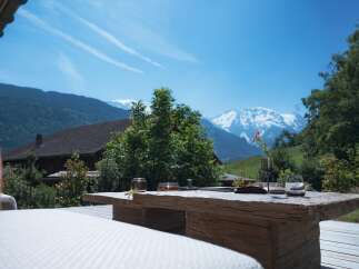 Experience breathtaking mountain views from this stunning property.