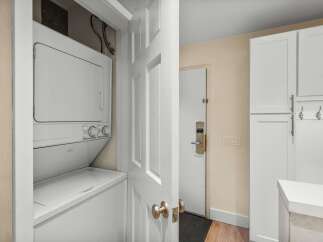 Discover the convenience of an in-unit washer and dryer, perfect for busy households.