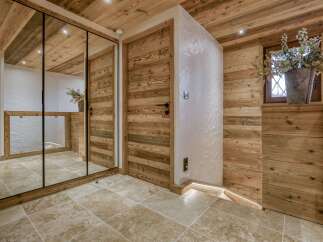 Experience rustic charm and modern luxury in this beautifully appointed hallway.