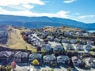 Discover this stunning hillside community offering breathtaking views of the lake and mountains.