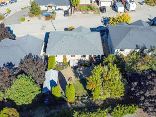 Discover this charming home with a spacious backyard, perfect for outdoor entertaining.