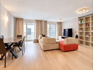 Experience modern living in this spacious open-concept apartment, featuring a combined dining and living area perfect for entertaining.