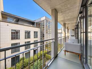 Enjoy the fresh air and city views from this spacious balcony, perfect for morning coffee or evening relaxation.