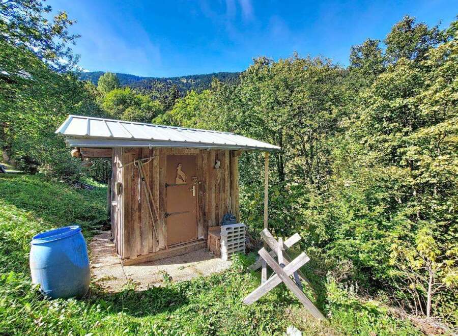 Discover this charming rustic outbuilding, perfect for storage or as a unique workshop space.