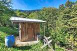 Discover this charming rustic outbuilding, perfect for storage or as a unique workshop space.