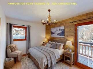 Experience cozy mountain living in this charming bedroom, featuring a rustic wooden accent wall and a plush, inviting bed.