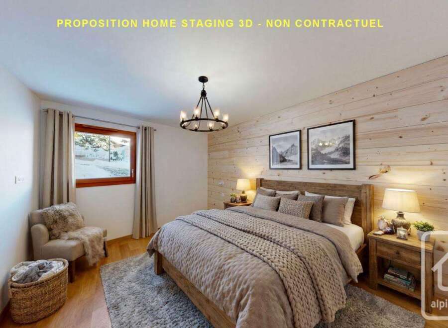 Experience cozy mountain living in this beautifully staged bedroom, featuring a rustic wooden accent wall and a comfortable queen-sized bed.