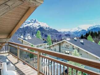 Experience breathtaking mountain views from this stunning balcony, perfect for enjoying your morning coffee or evening relaxation.
