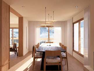 Experience luxurious mountain living in this stunning dining room, featuring a long, dark wood table perfect for hosting gatherings.