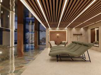 Experience ultimate relaxation in this luxurious spa area, featuring comfortable lounge chairs and a serene ambiance.
