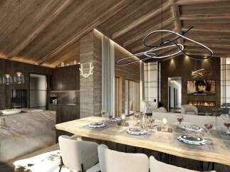 Experience luxury mountain living in this stunning open-concept dining and living area.