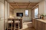 Experience rustic charm in this mountain retreat, featuring a cozy kitchen with natural wood finishes and a stone accent wall.