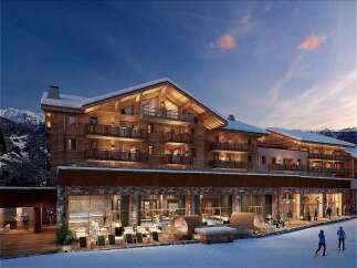 Experience luxury mountain living in this stunning chalet-style hotel, nestled amidst snow-capped peaks.
