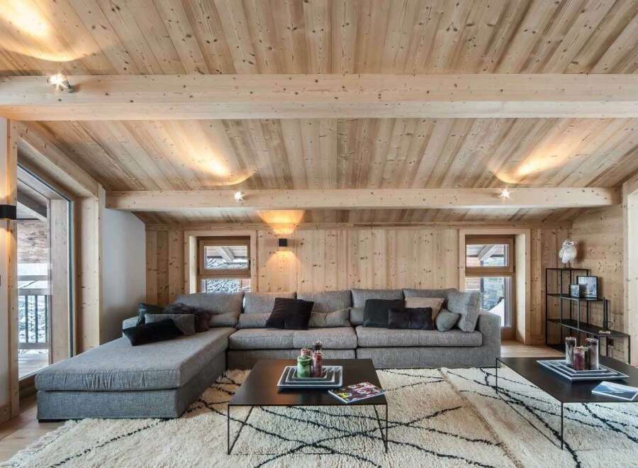 Experience ultimate comfort and style in this beautifully appointed living room, featuring a spacious sectional sofa perfect for relaxation.