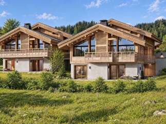 Experience luxury mountain living in these stunning modern chalets, nestled amidst a picturesque alpine landscape.